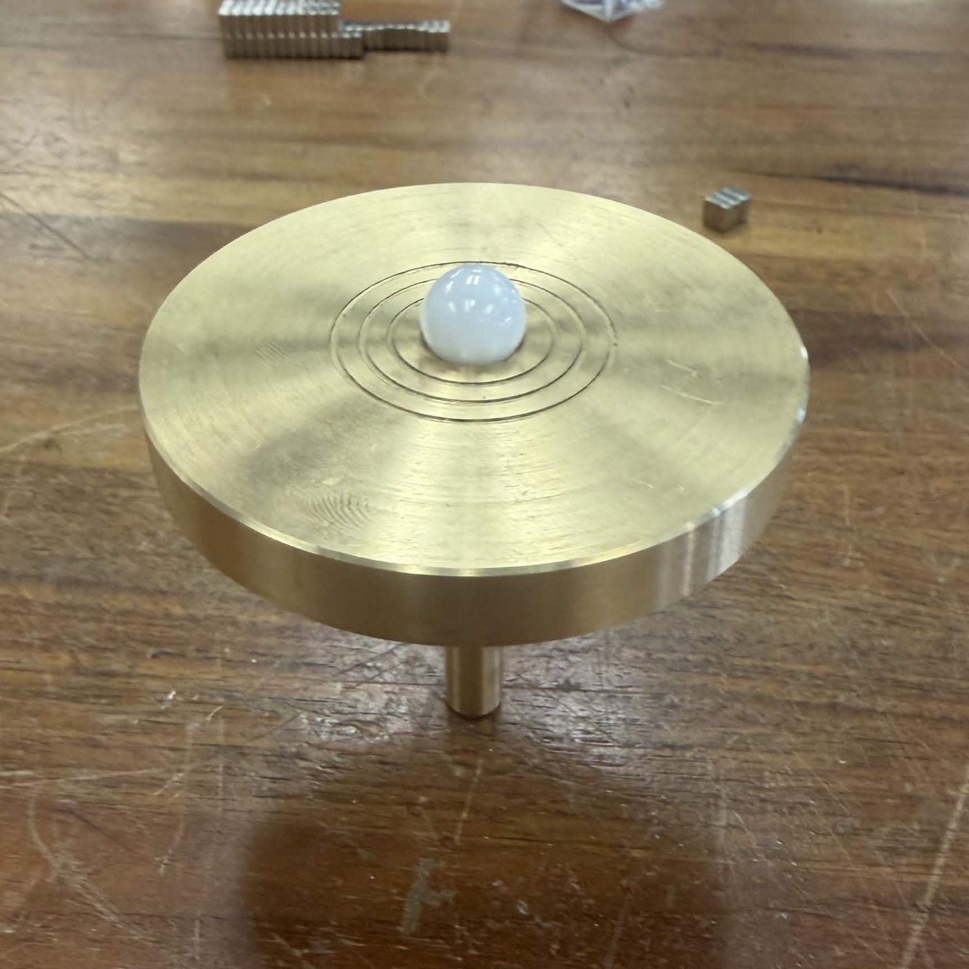 Brass flywheel with the zirconia contact ball